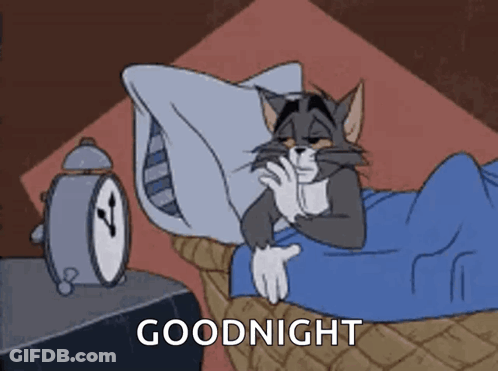 A Cartoon Of A Cat Laying In Bed With An Alarm Clock And The Words Goodnight Written On The Bottom . GIF