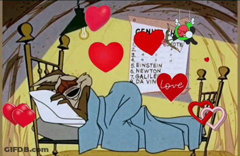 A Cartoon Of A Coyote Laying In A Bed With Hearts Surrounding Him GIF