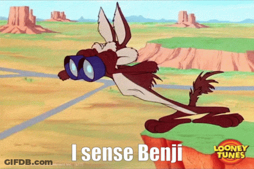 Cartoon Coyote With Binoculars Says I Sense Benji GIF