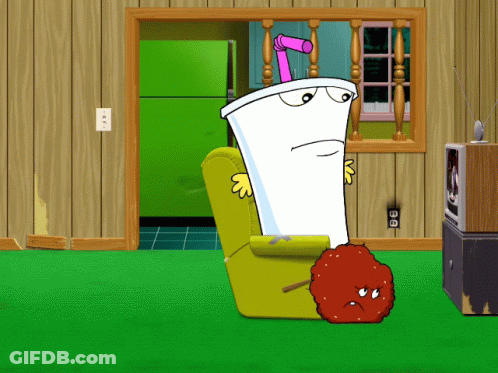 A Cartoon Of A Cup With A Straw Sitting On A Chair GIF