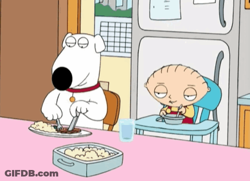 A Cartoon Of A Dog And A Baby Sitting At A Table Eating GIF