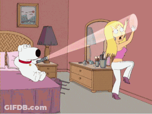 A Cartoon Of A Dog Sitting On A Bed Next To A Woman Standing In Front Of A Mirror GIF