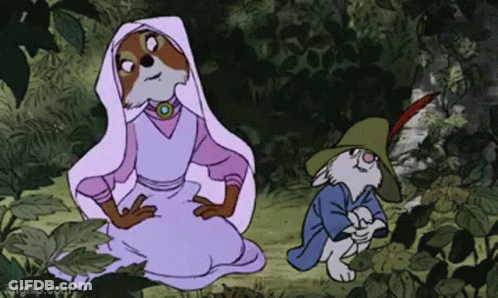 A Cartoon Of A Fox And A Rabbit In A Forest . GIF