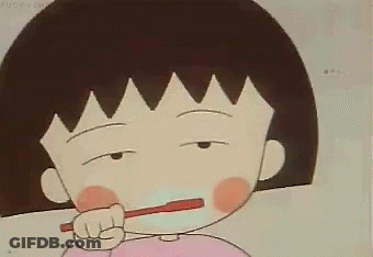 A Cartoon Of A Girl Brushing Her Teeth With A Toothbrush GIF