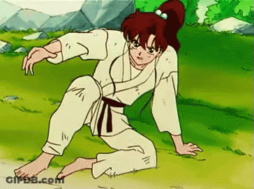 A Cartoon Of A Girl In A Karate Uniform Kneeling On The Ground . GIF