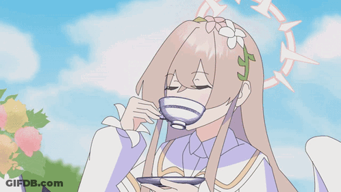 A Cartoon Of A Girl Sitting At A Table With A Cup Of Coffee GIF