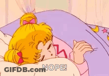 A Cartoon Of A Girl Sleeping In A Bed With The Words `` Nope '' Written On The Blanket . GIF