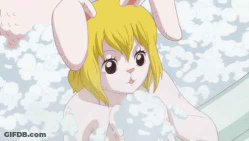 A Cartoon Of A Girl With Bunny Ears Holding A Bubble GIF