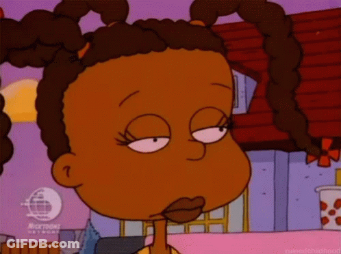 A Cartoon Of A Girl With Pigtails Making A Funny Face . GIF