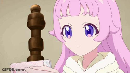 A Cartoon Of A Girl With Pink Hair Making A Shocked Face GIF