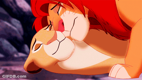 A Cartoon Of A Lion And A Lioness With Their Eyes Closed GIF