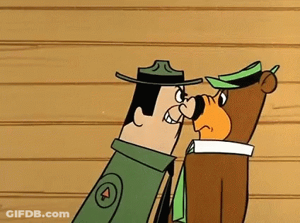 A Cartoon Of A Man And A Bear Standing Next To Each Other And Looking At Each Other . GIF
