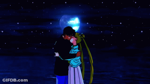 A Cartoon Of A Man And Woman Hugging Under A Full Moon GIF