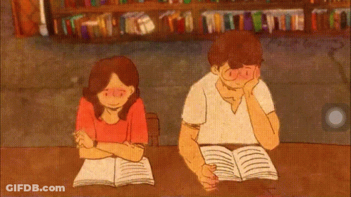 A Cartoon Of A Man And Woman Reading Books GIF