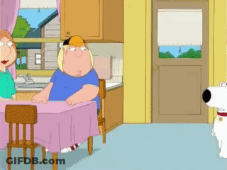 A Cartoon Of A Man And Woman Sitting At A Table With A Dog Standing In Front Of Them GIF