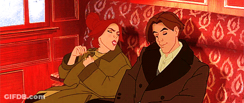 A Cartoon Of A Man And Woman Sitting On A Couch GIF