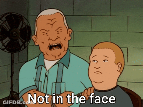 A Cartoon Of A Man Getting His Hair Cut With The Words Not In The Face GIF