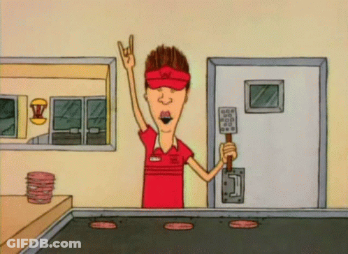 A Cartoon Of A Man Holding A Spatula In A Restaurant GIF