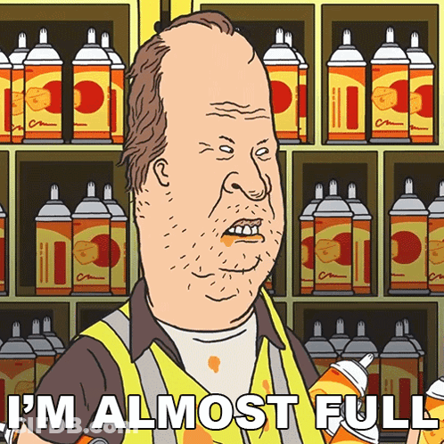 A Cartoon Of A Man Holding A Spray Can With The Words " I 'M Almost Full " Below Him GIF