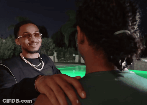 A Cartoon Of A Man Holding Another Man 'S Hand While Another Man Looks On GIF