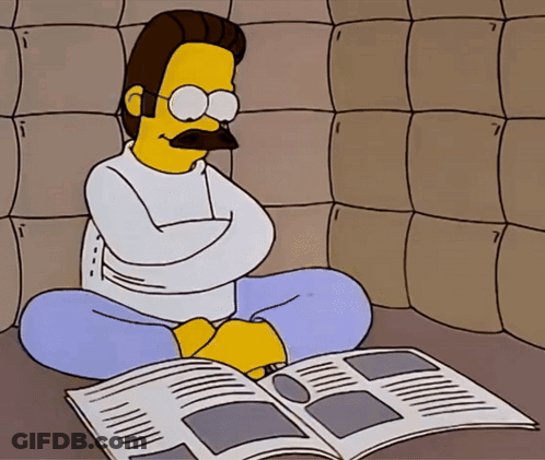 A Cartoon Of A Man In A Strait Jacket Reading A Magazine GIF