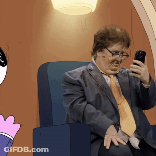 A Cartoon Of A Man In A Suit And Tie Looking At His Phone GIF