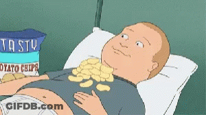 A Cartoon Of A Man Laying On A Bed With A Bag Of Tasty Potato Chips GIF