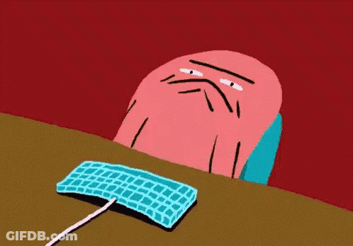 A Cartoon Of A Man Sitting At A Desk With A Keyboard GIF