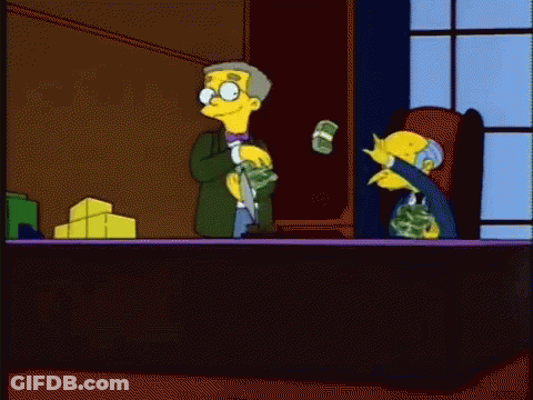 A Cartoon Of A Man Sitting At A Desk With Money Flying Around Him GIF