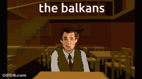A Cartoon Of A Man Sitting At A Table With The Words The Balkans Behind Him GIF