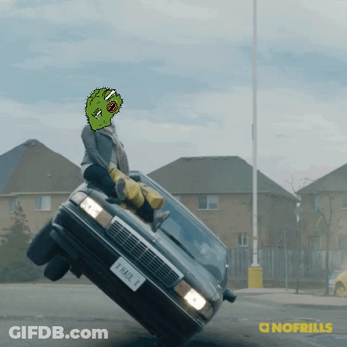 A Cartoon Of A Man Sitting On Top Of A Car With A License Plate That Says Thak 1 GIF