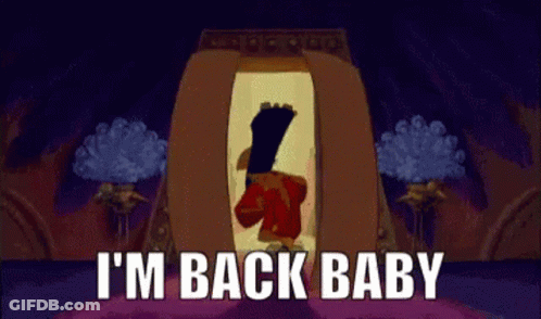 A Cartoon Of A Man Standing In A Doorway With The Words I 'M Back Baby Behind Him . GIF