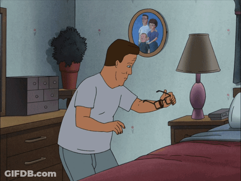 A Cartoon Of A Man Standing In Front Of A Picture Of His Family GIF