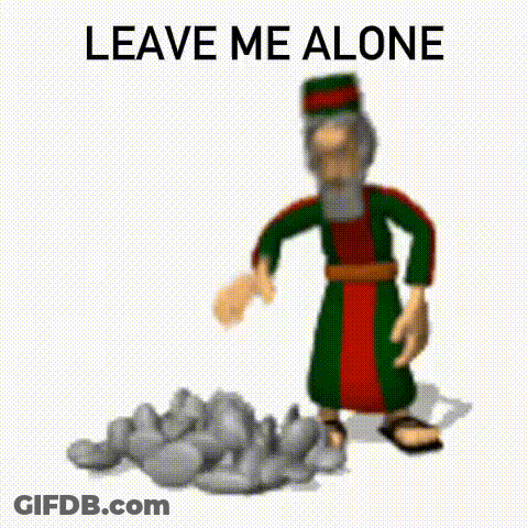 A Cartoon Of A Man Standing Next To A Pile Of Rocks With The Words `` Leave Me Alone '' Written Below Him . GIF