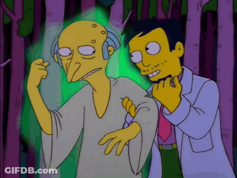 A Cartoon Of A Man Standing Next To Another Man With Green Eyes GIF