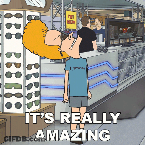 A Cartoon Of A Man Wearing A Metallica Shirt Standing In A Store GIF