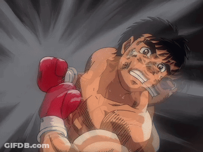A Cartoon Of A Man Wearing Red Boxing Gloves With The Letter S On The Bottom GIF