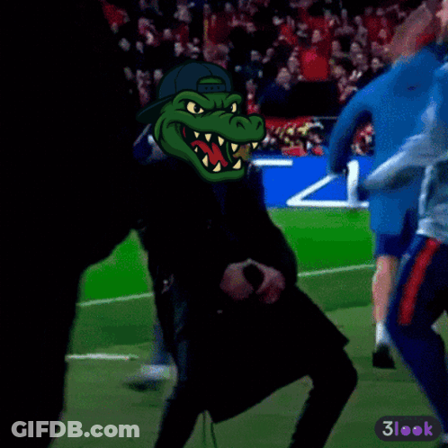 A Cartoon Of A Man With A Crocodile Head On A Soccer Field With The Words 3Look At The Bottom GIF