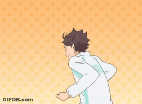 A Cartoon Of A Man With His Fist In The Air And A Polka Dot Background GIF