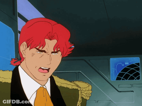 A Cartoon Of A Man With Red Hair Making A Face GIF