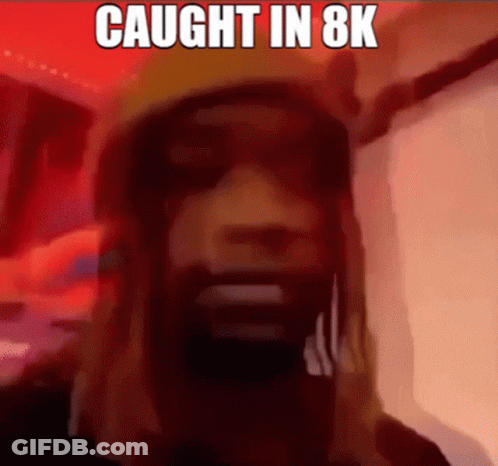 A Cartoon Of A Man With The Words Caught In 8K On Top Of Him GIF