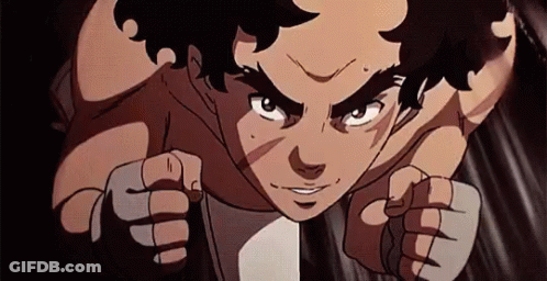 A Cartoon Of A Man Without A Shirt Is Fighting With His Fists . GIF