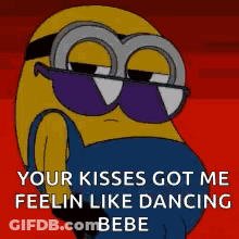 A Cartoon Of A Minion Wearing Sunglasses And Saying `` Your Kisses Got Me Feelin Like Dancing Bebe '' GIF