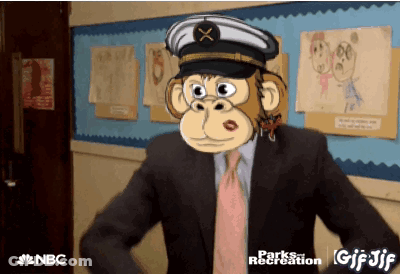 A Cartoon Of A Monkey In A Suit And Tie With A Nbc Logo In The Corner GIF