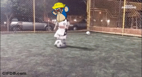 A Cartoon Of A Monkey Kicking A Soccer Ball On A Field That Says Awesome On The Bottom GIF
