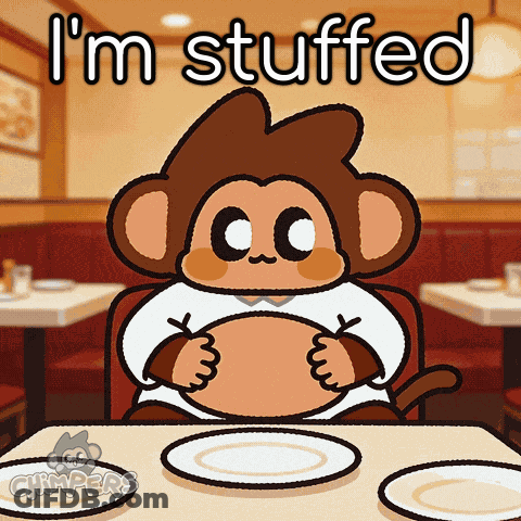 A Cartoon Of A Monkey Sitting At A Table With The Words I 'M Stuffed GIF