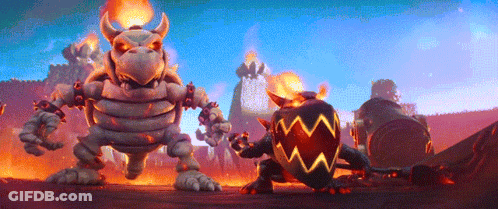 A Cartoon Of A Monster With Horns Standing Next To Another Monster With A Shield GIF