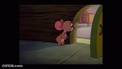 A Cartoon Of A Mouse Standing In A Doorway GIF