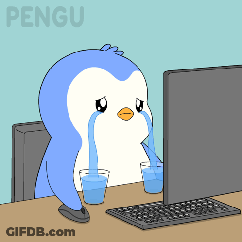 A Cartoon Of A Penguin Crying While Looking At A Computer Screen GIF