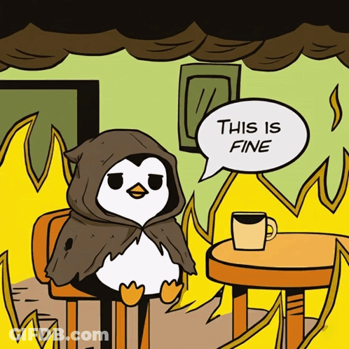 A Cartoon Of A Penguin Sitting At A Table With A Speech Bubble That Says " This Is Fine " GIF